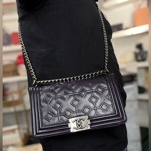 Chanel Limited Purple Boy Bag plus another bag that I won’t say the name of